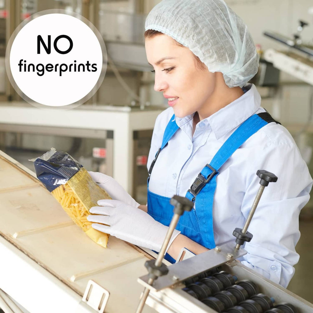 White cotton gloves on a worker’s hands, detail of grip and application