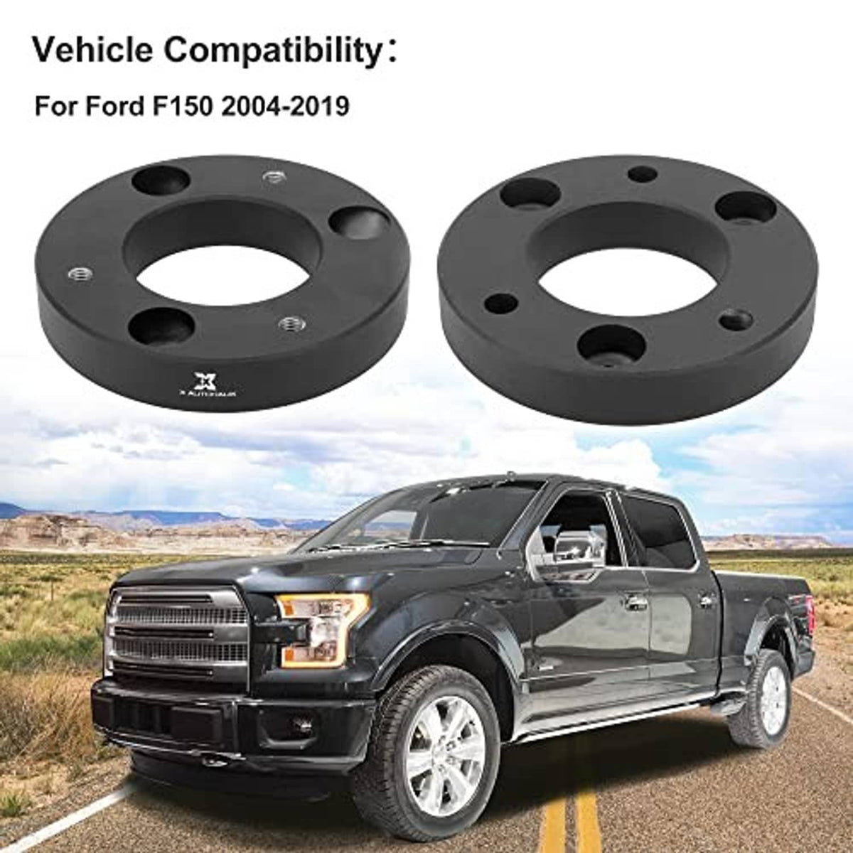 Two black front leveling lift spacers with bolt holes, shown with a pickup truck