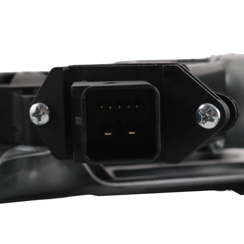 Black electrical connector on window regulator motor assembly with pins