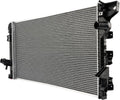 Vehicle radiator with silver aluminum cooling fins and black plastic end tanks, hose fittings
