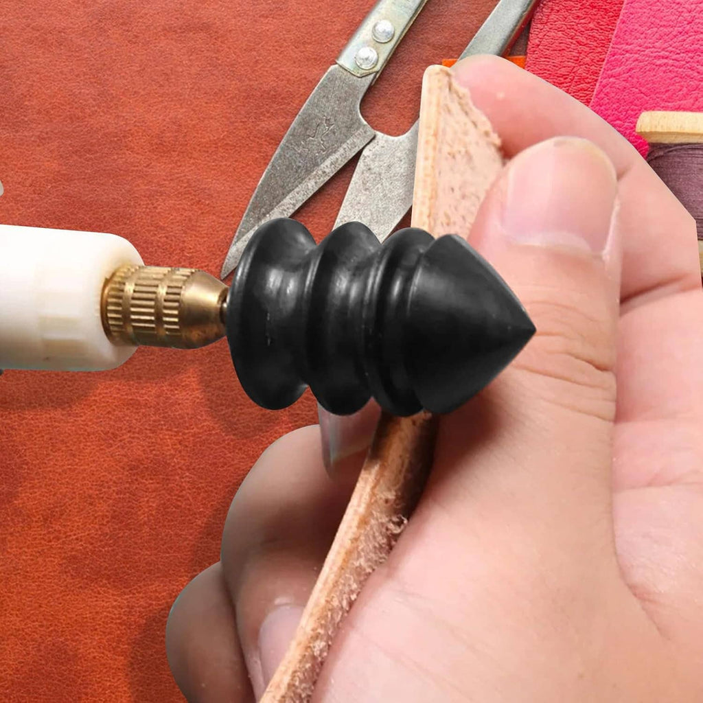 Close-up of black leather burnisher bit pressing on textured leather edge