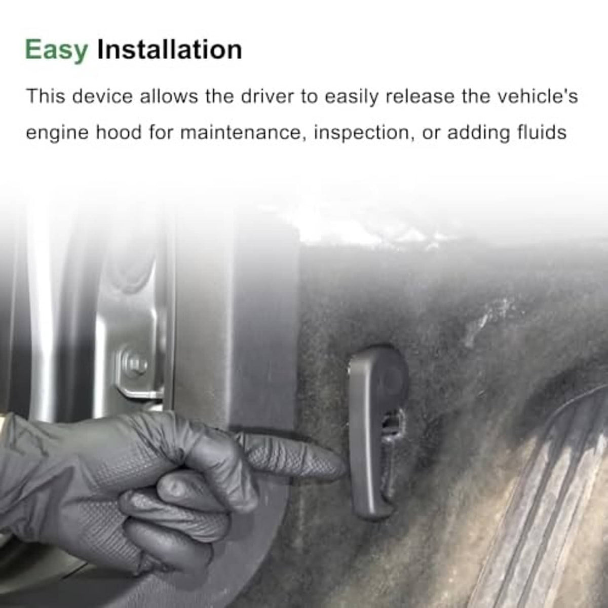 Black hood release pull handle installed near engine hood latch mechanism