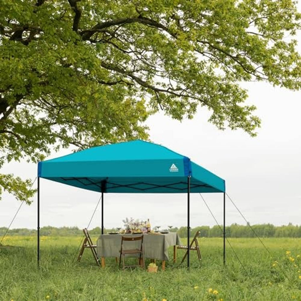 Blue straight-leg pop up canopy top replacement with peaked roof outdoors