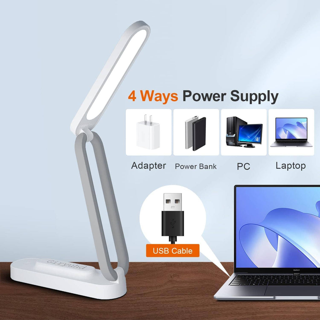 Foldable white LED desk lamp with USB cable shown and glowing light bar on base
