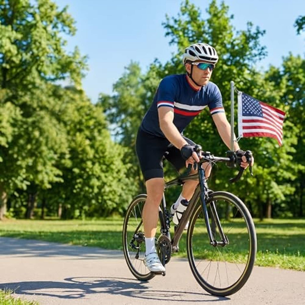 Small American flag on a handheld stick while cycling outdoors