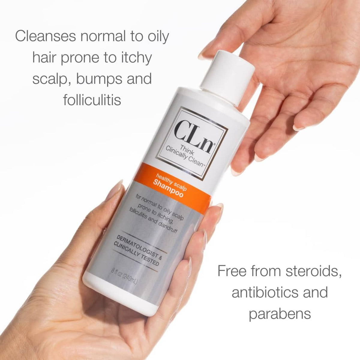 Hand holding CLn healthy scalp shampoo bottle over text about normal to oily scalp