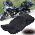 Black motorcycle rider and passenger seat with contoured cushions and smooth top.