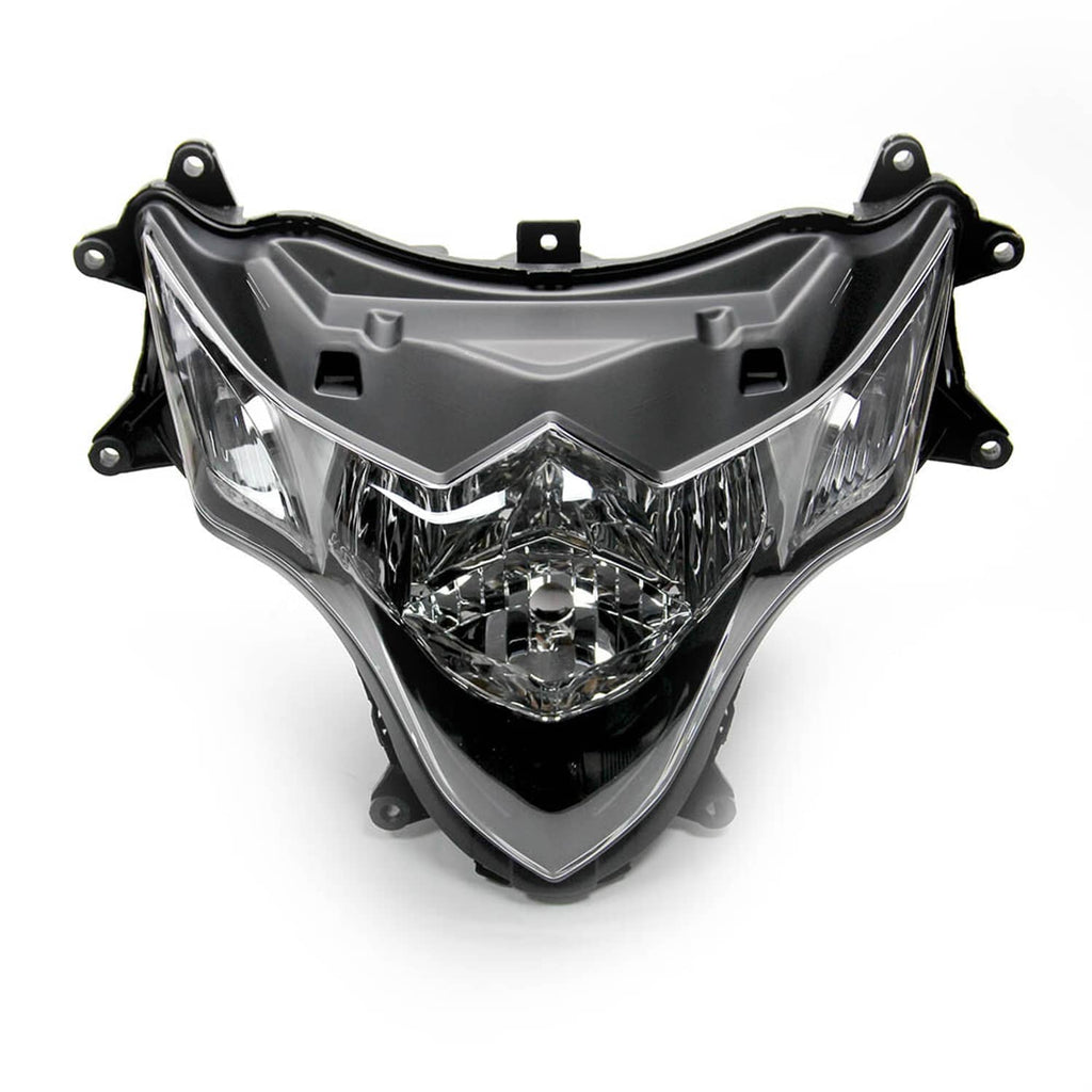 Front headlight housing assembly with clear lens, black bezel, and chrome reflector core