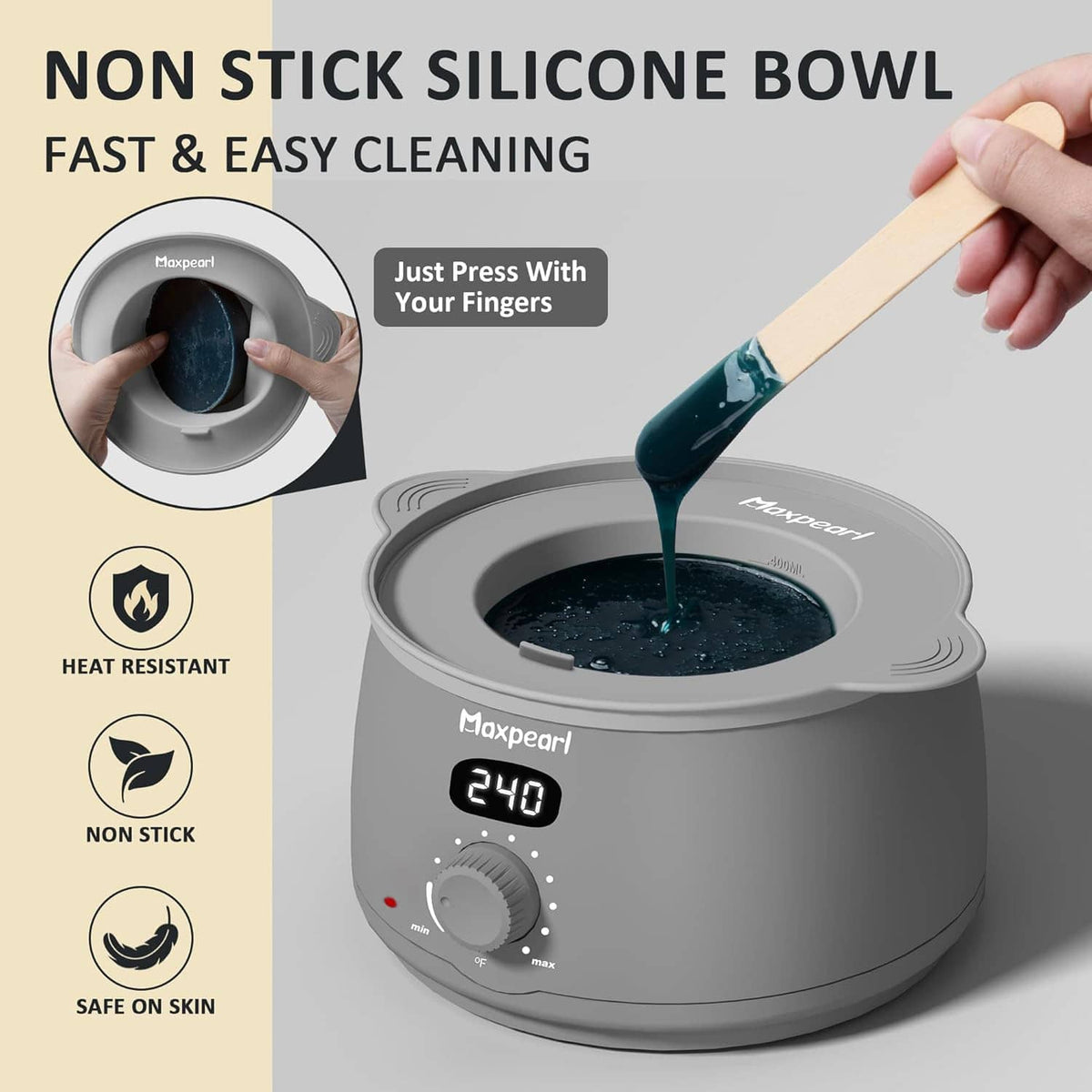 Non-stick silicone bowl waxing warmer with blue wax being poured from a spatula