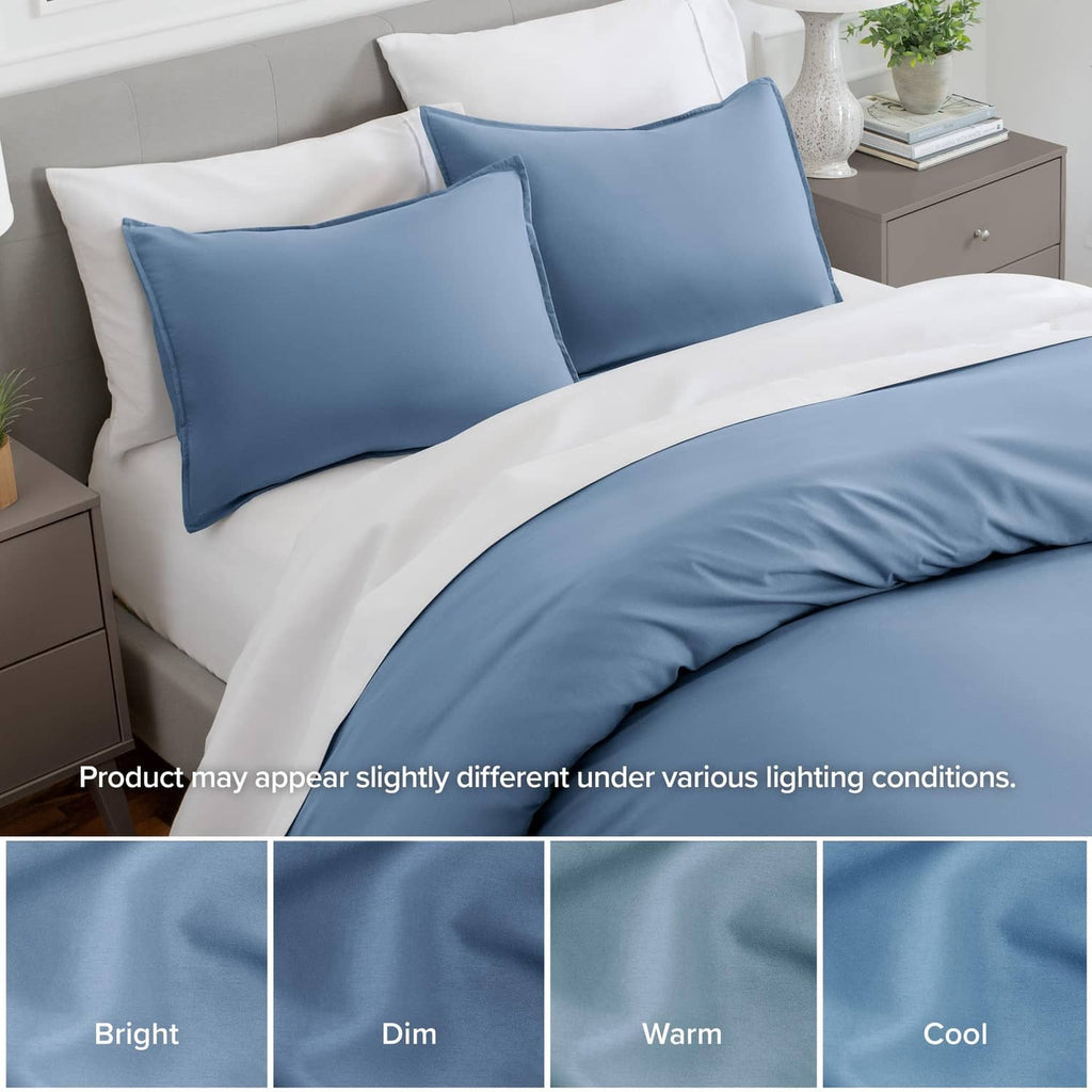 Blue microfiber pillow shams on bed with coordinating standard pillow sizes