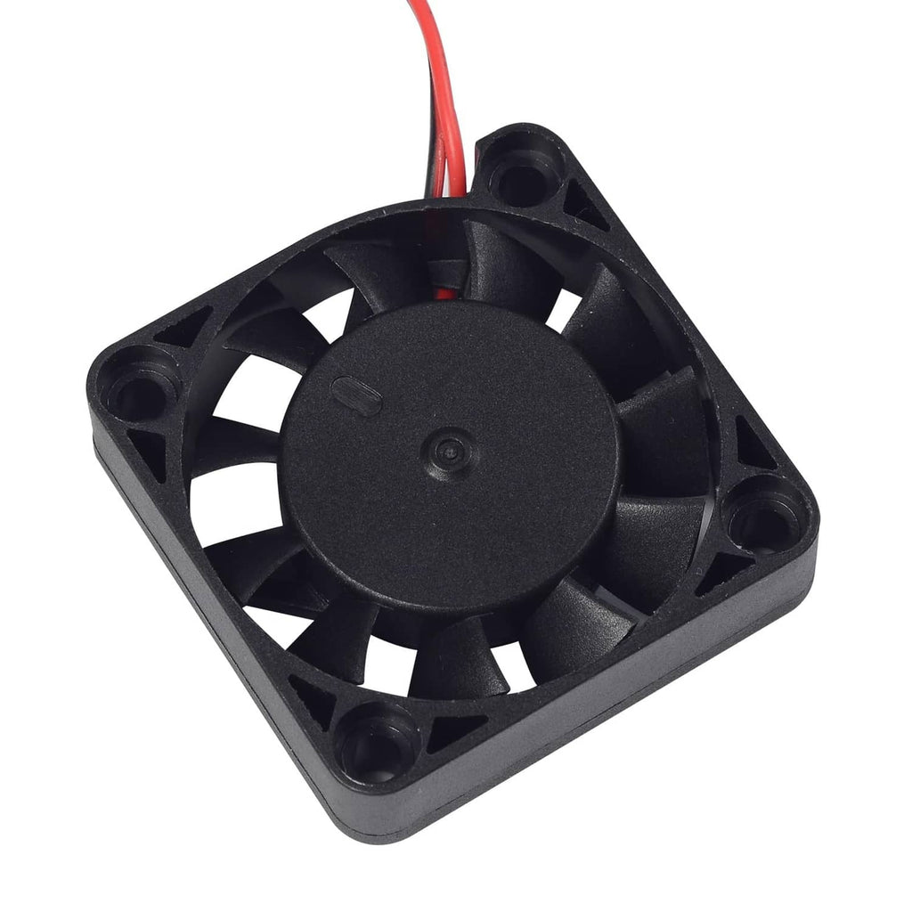 Square black cooling fan with circular blades and four mounting corners, red power lead