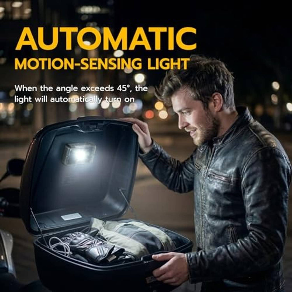 Black motion-sensing LED interior light with bright front LED on open compartment
