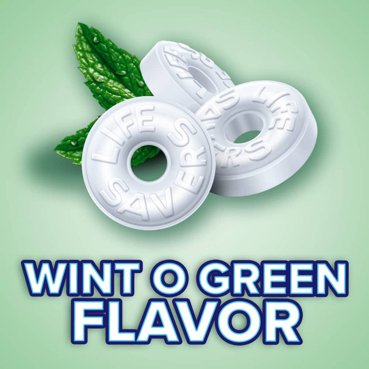 Round white hard candy mint pieces with green leaf accents