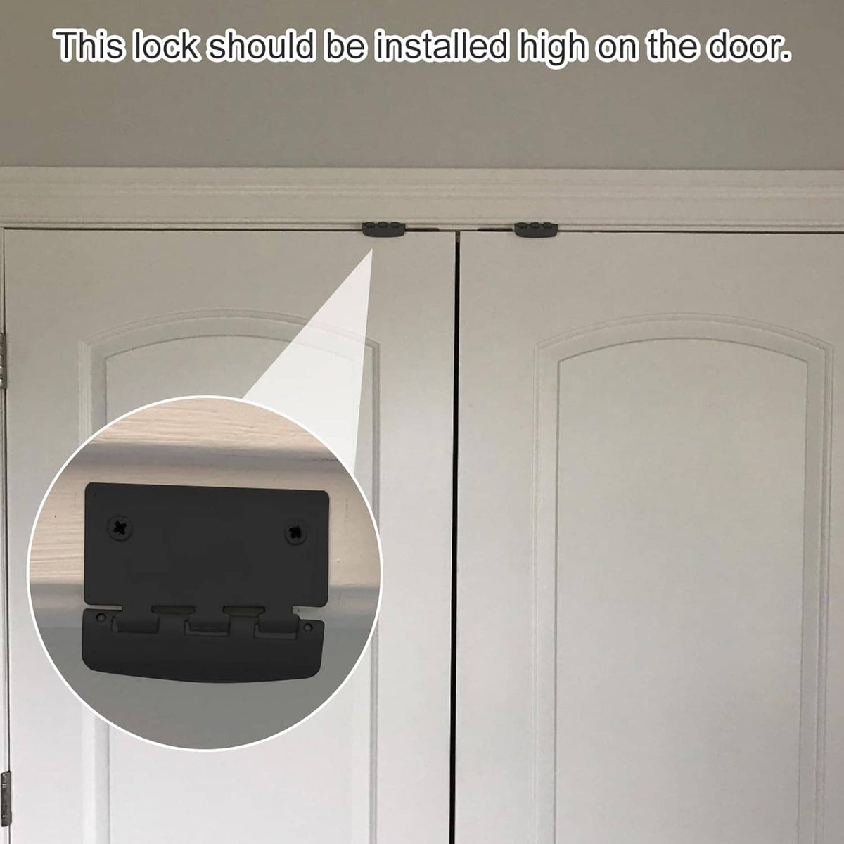 Black flip action door lock mounted high on door panel
