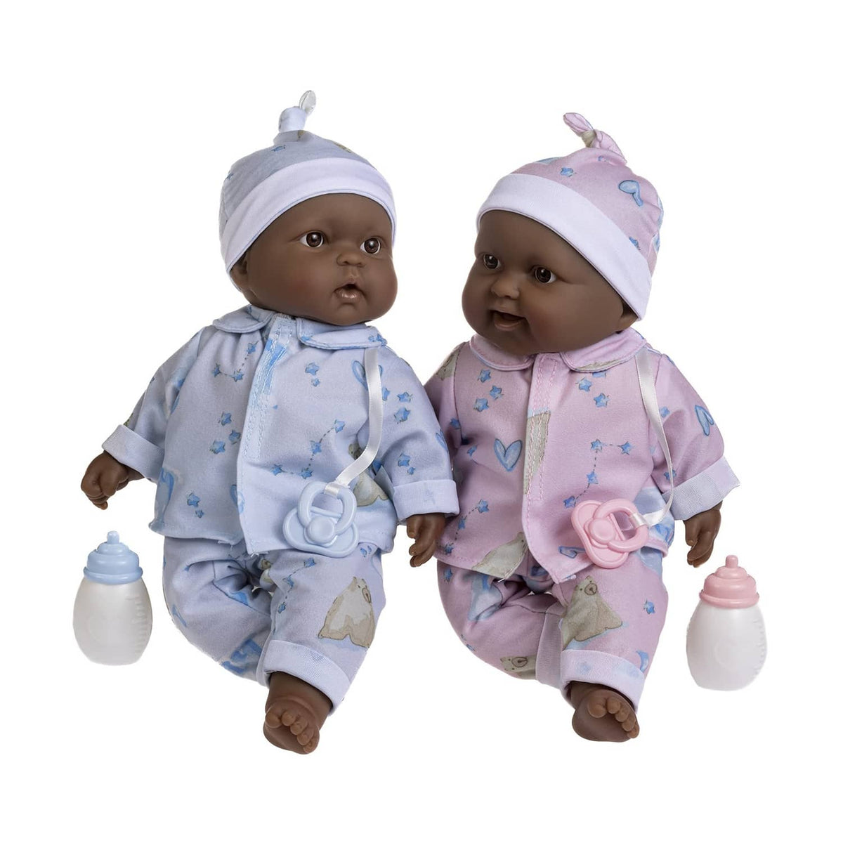 Twin soft body baby dolls in blue and pink caps and outfits, with bottles and pacifiers