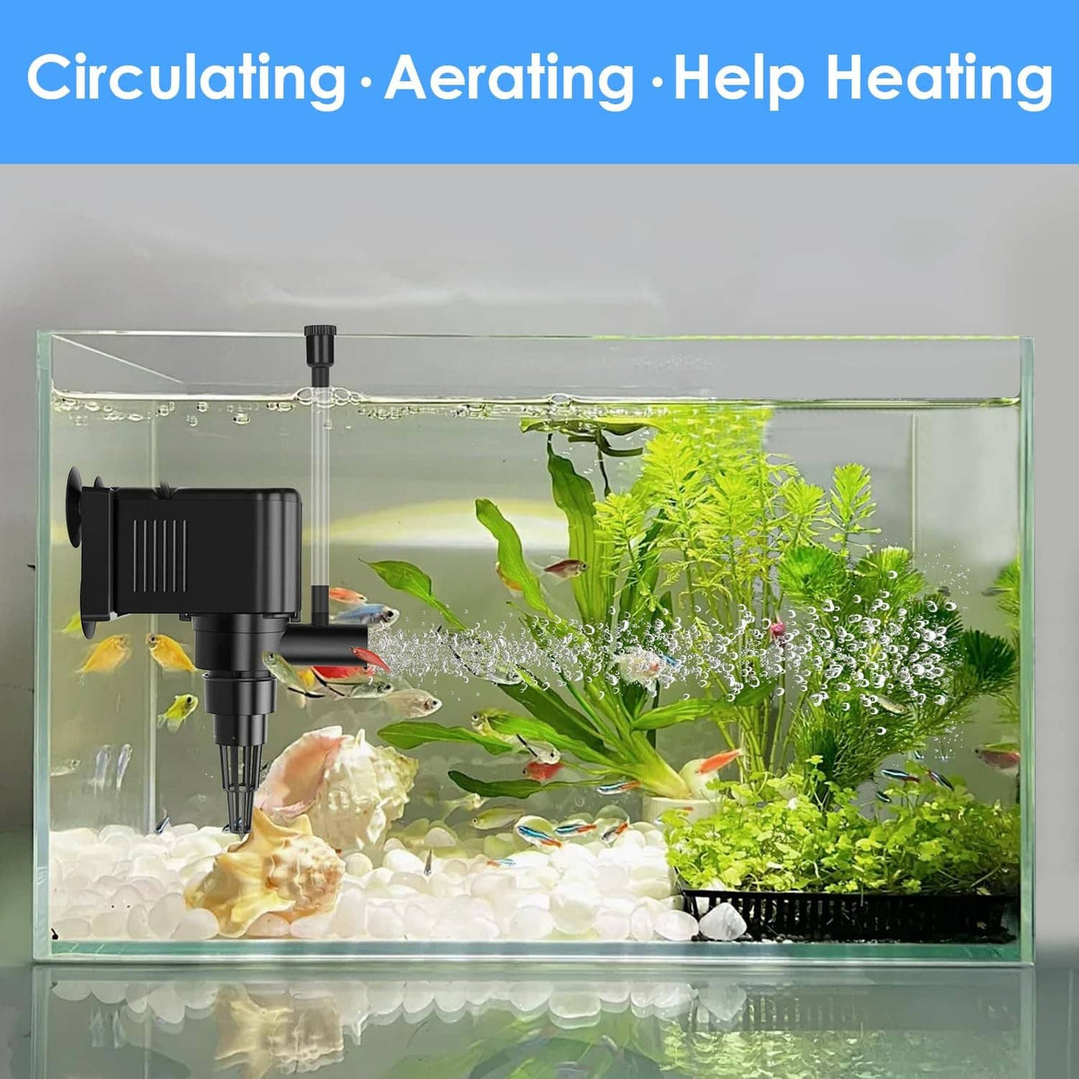 Black aquarium powerhead pump installed in tank with suction cups