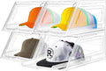 Clear multi-compartment hat organizer with stackable drawer holding colorful baseball caps