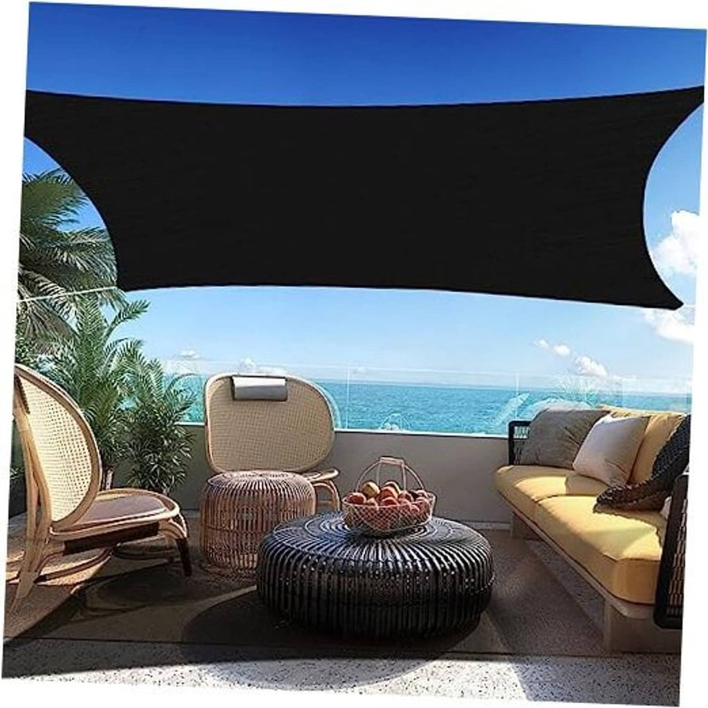 Black rectangle sun shade sail canopy over outdoor seating, curved corners and tie-off points