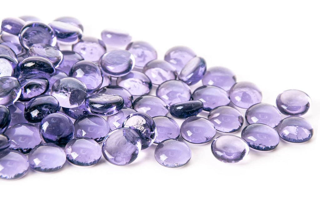 Purple mini glass gems, round and faceted, in a mixed pile for crafts or mancala