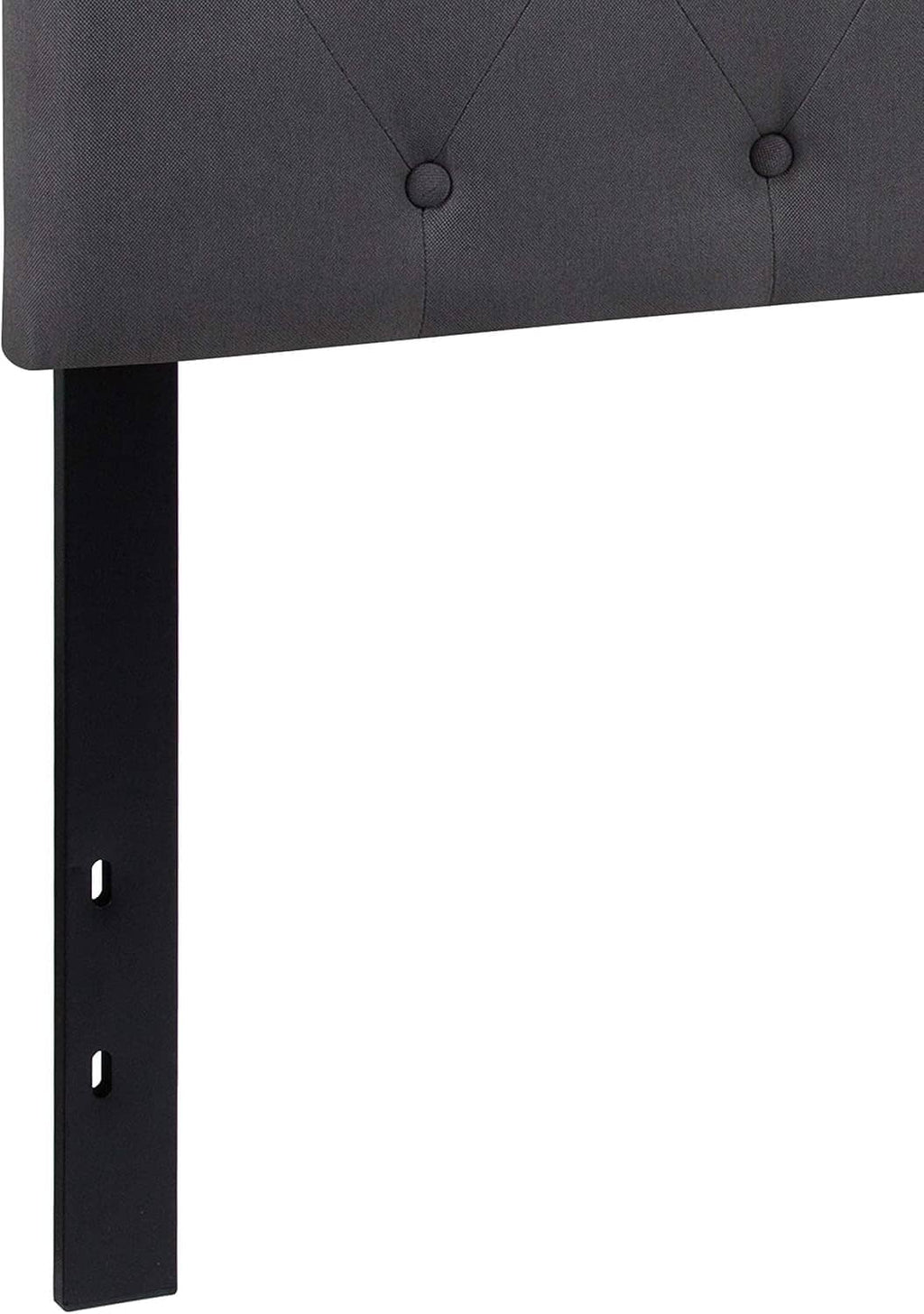 Close-up of dark gray tufted headboard side with black adjustable feet