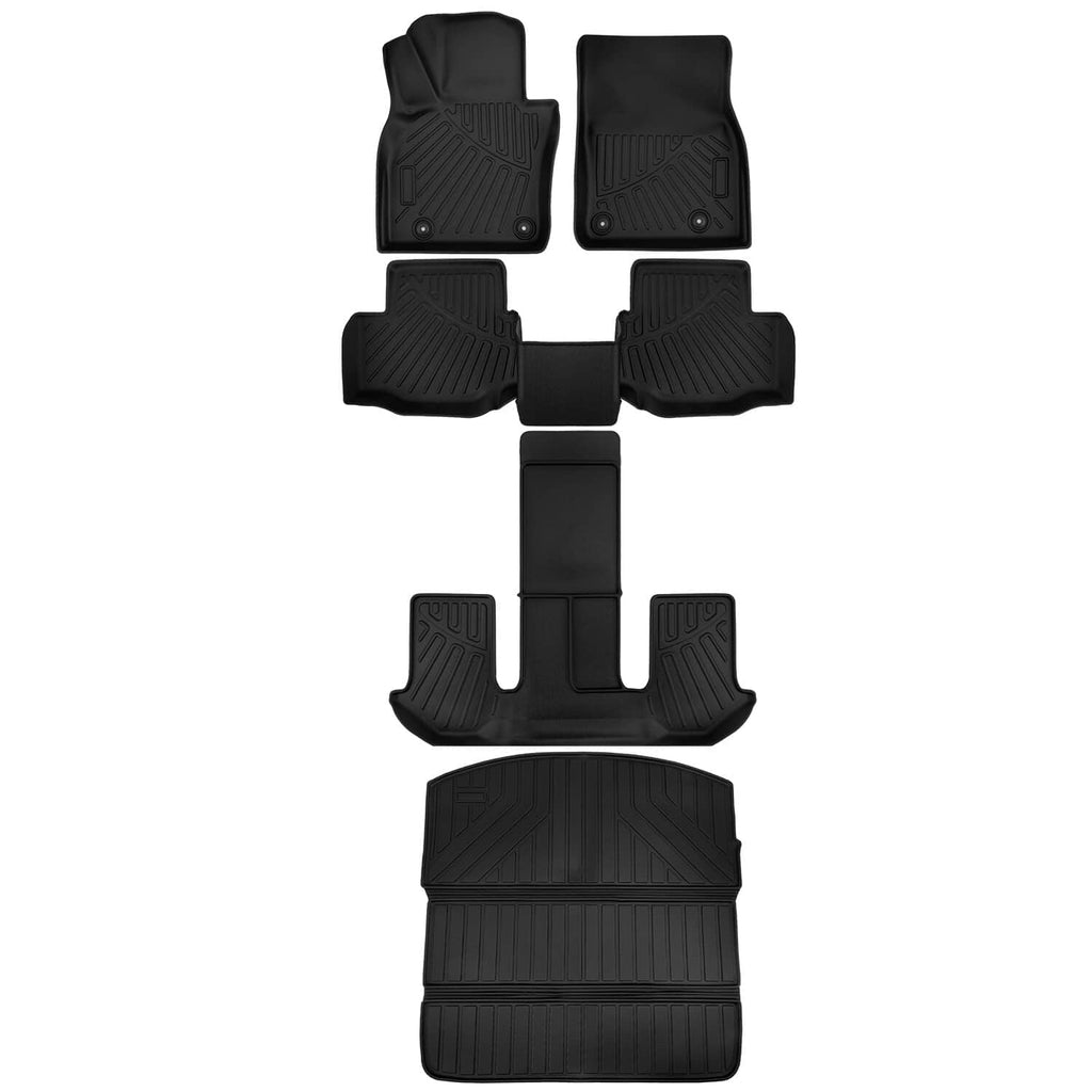 Black car floor mats and trunk liner with textured ridges and molded cutouts