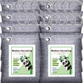 Grey cloth odor absorber bag with metal grommet and printed label.