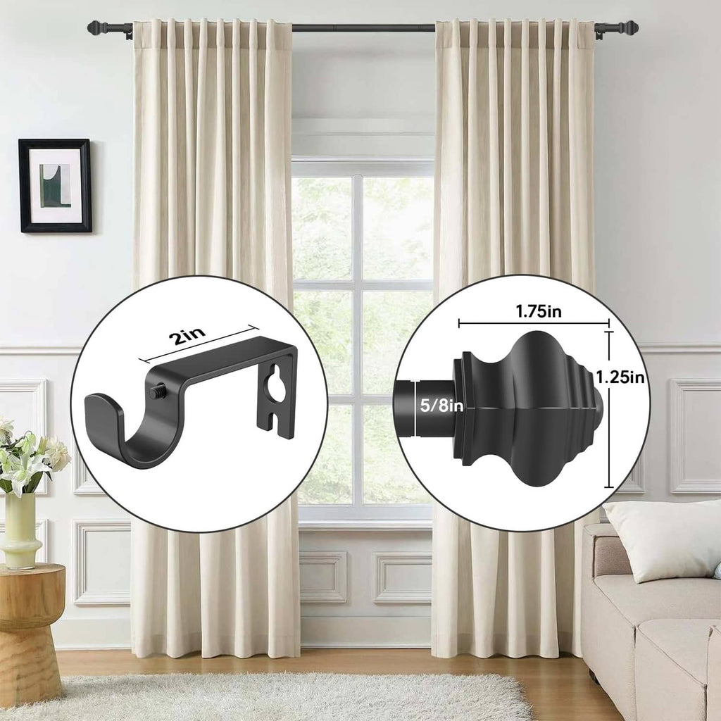 Matte black curtain rod with beige floor-length curtains and end brackets