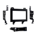Single DIN dash kit with black bezel frame and mounting brackets for wireless radio