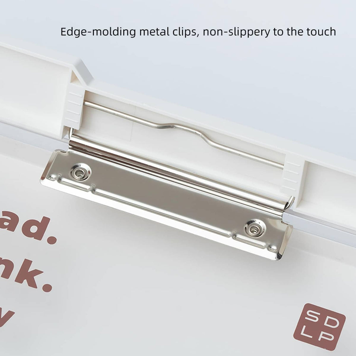 Metal edge clip on white clipboard with edge-molding tabs