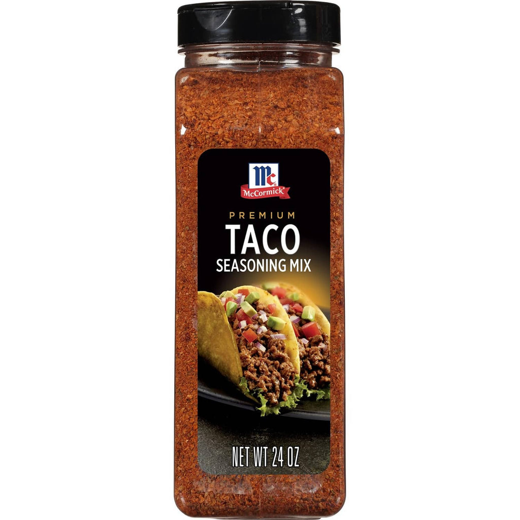 McCormick Premium Taco Seasoning Mix jar with black cap, filled with reddish seasoning