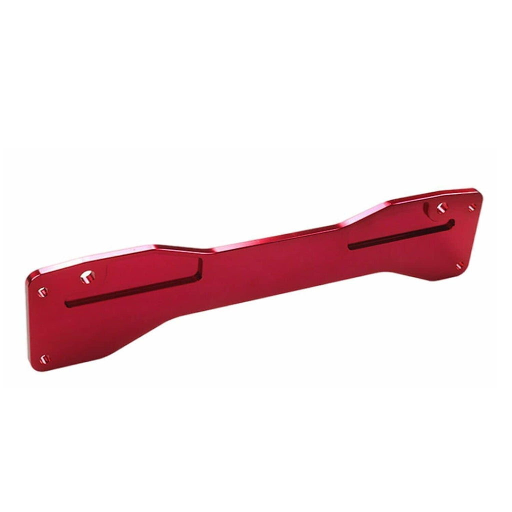 Red rear lower control arm subframe brace with elongated shape and mounting slots