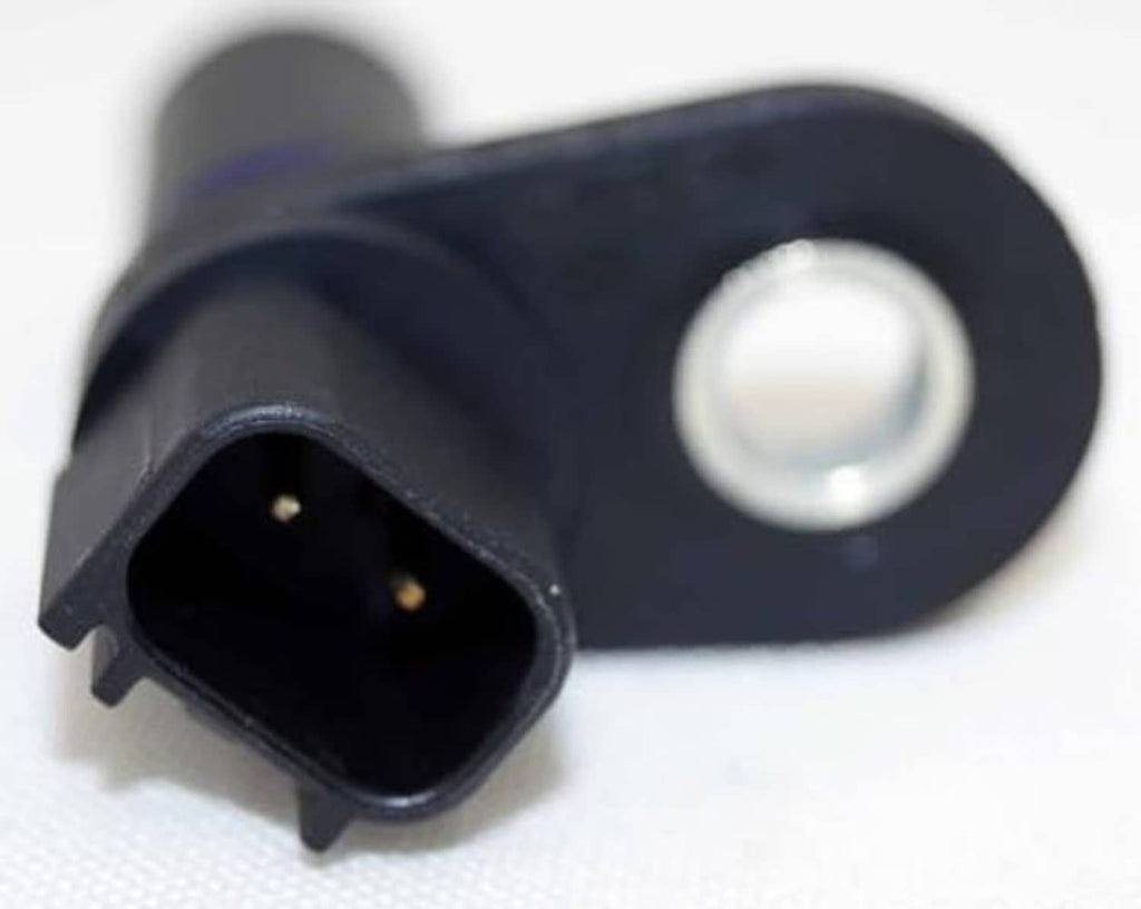 Camshaft position sensor showing black electrical connector with two gold pins