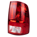 Red and clear right tail light with reflector-style sections and rounded outer housing