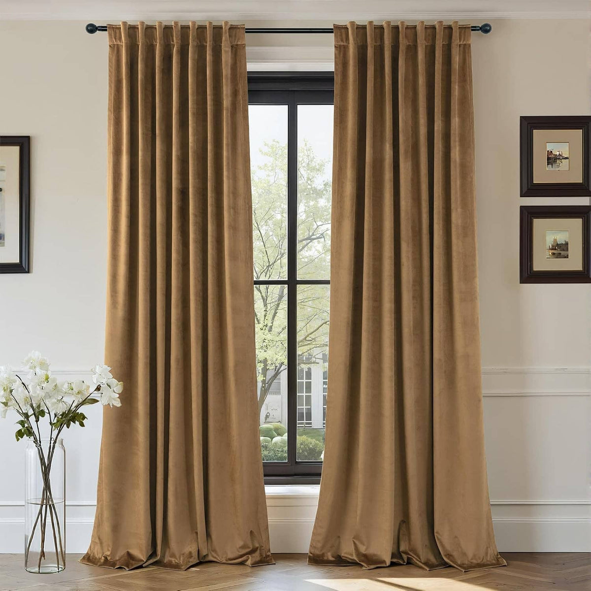 Gold brown velvet light-blocking curtains, two panels hanging by a window.