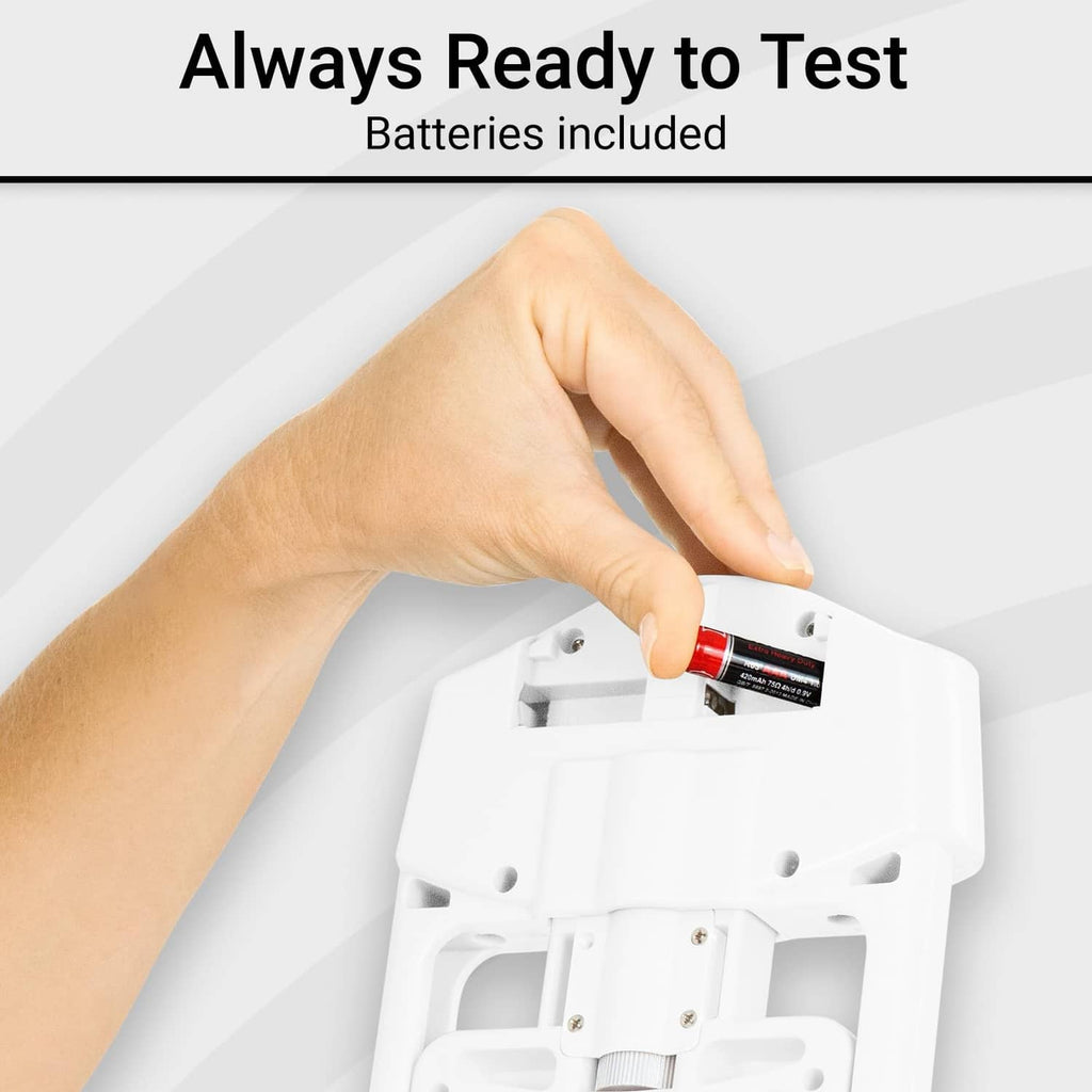 White grip strength tester with open battery compartment and inserted battery