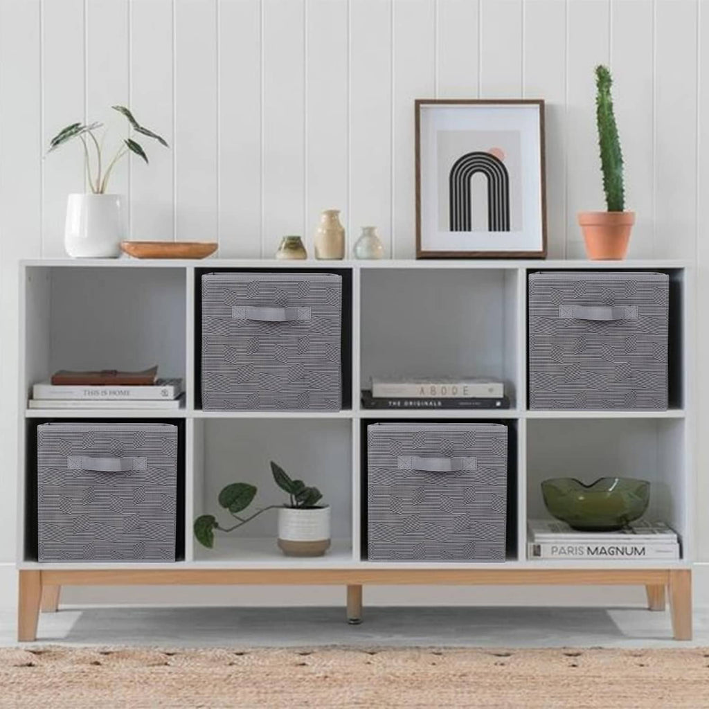 Set of foldable dark gray fabric storage bins with black stripe handles