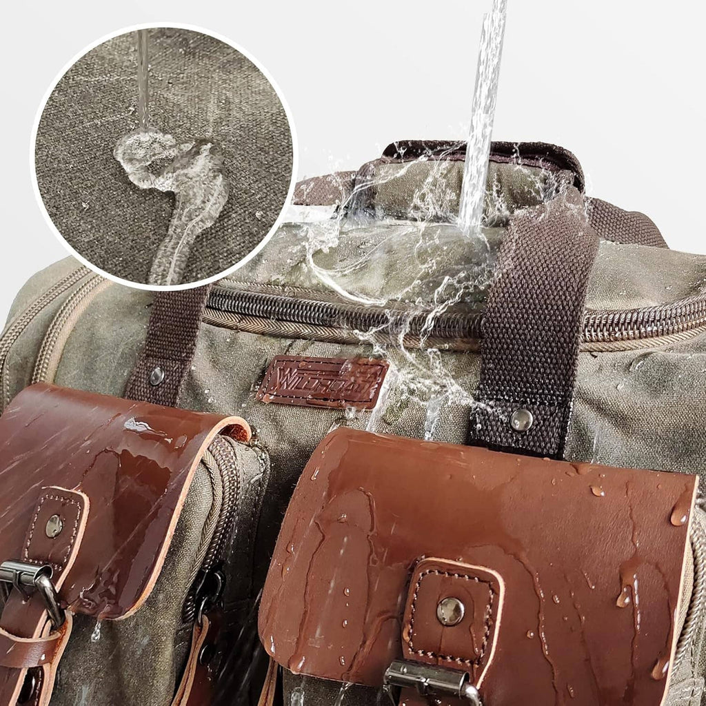 Waxed canvas duffel bag close-up with zippers and water-shedding front leather pockets
