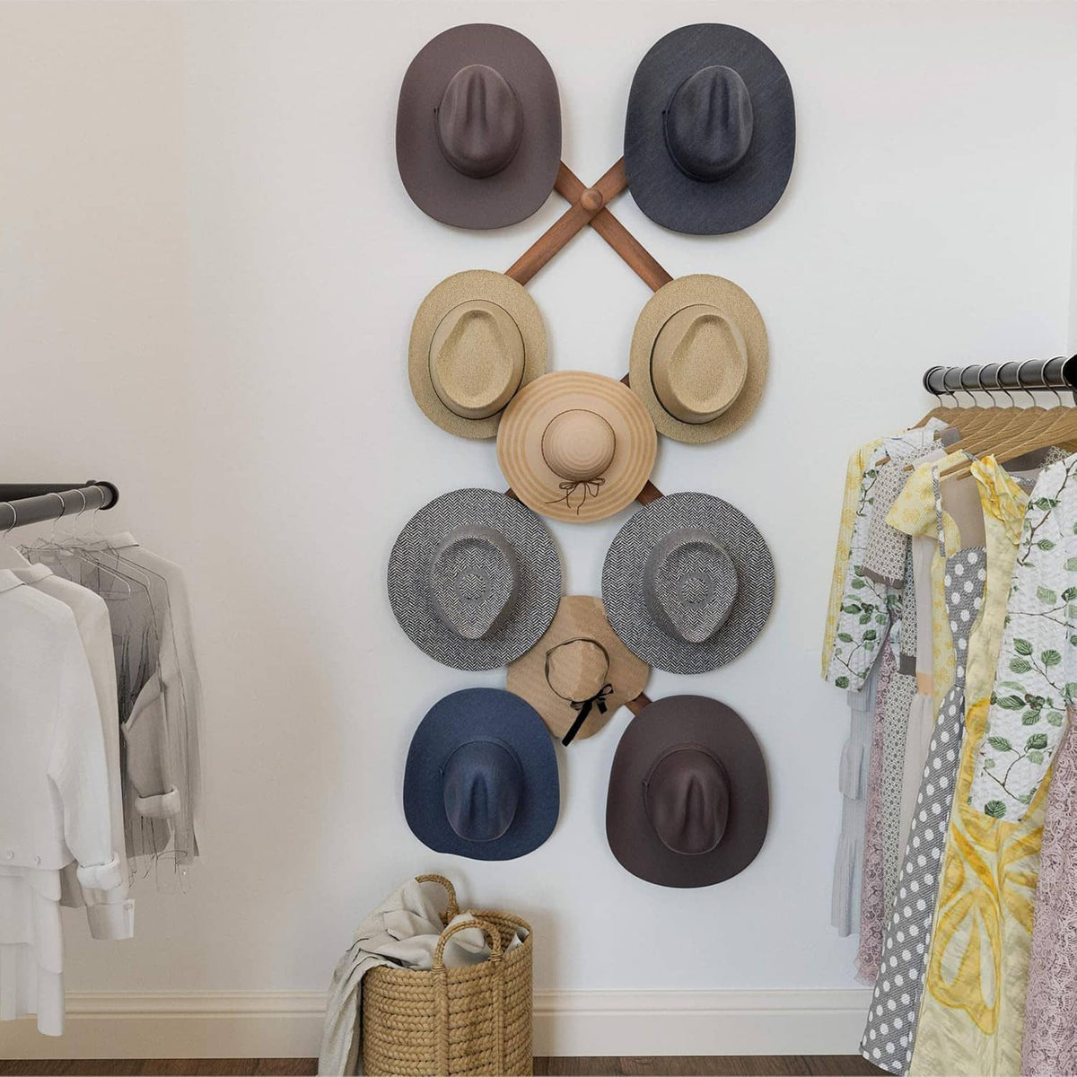 Accordion hat rack display with round hooks supporting multiple hats on the wall