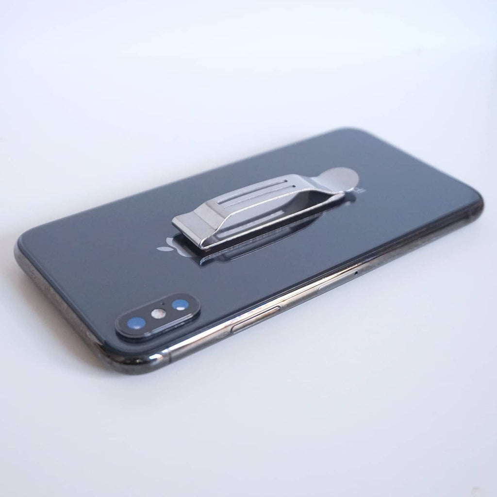 Silver pocket clip attached to a phone case
