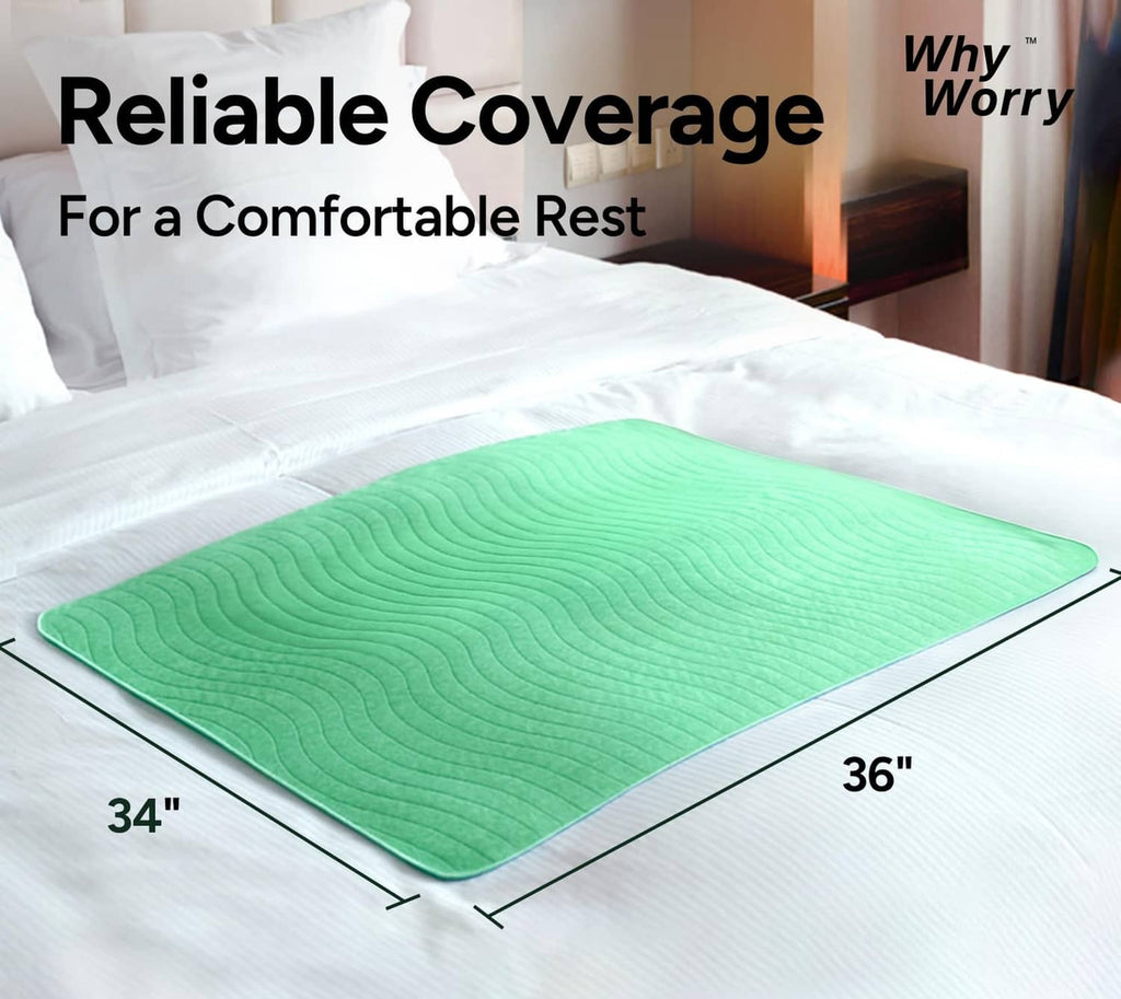 Green washable bed underpad, rectangular sheet laid flat on a mattress