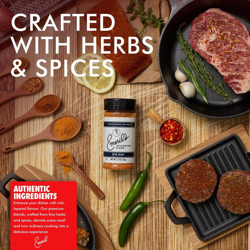 Emeril's seasoning jar with herbs and spices on a cutting board, with lemon nearby