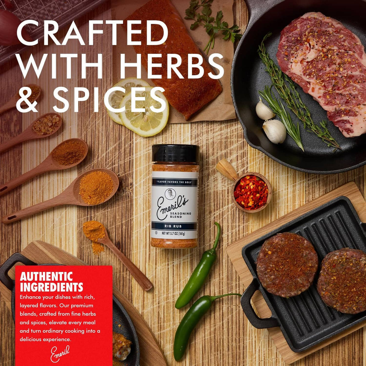 Emeril's seasoning jar with herbs and spices on a cutting board, with lemon nearby
