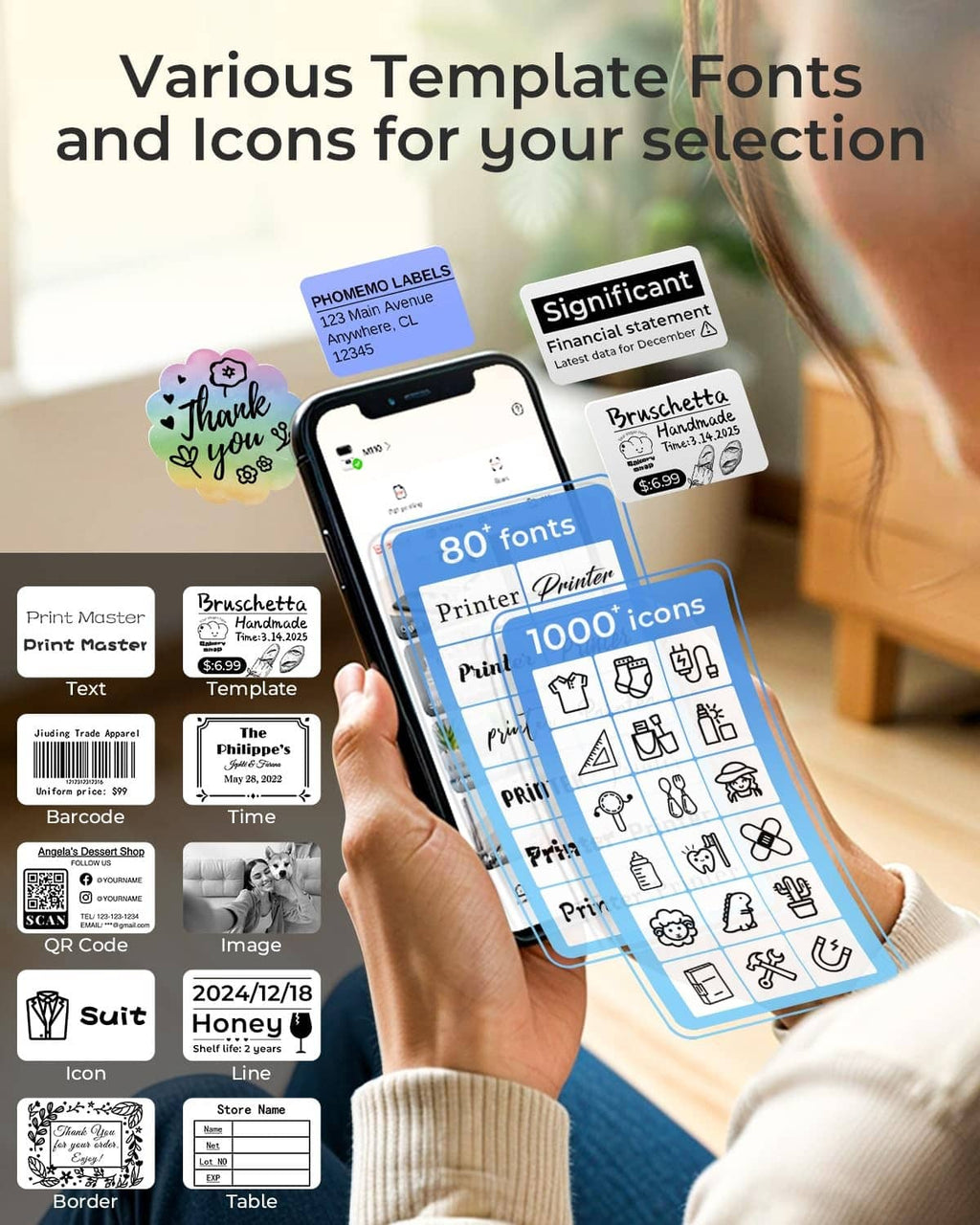 Hand holding smartphone with label icons beside black thermal label printer