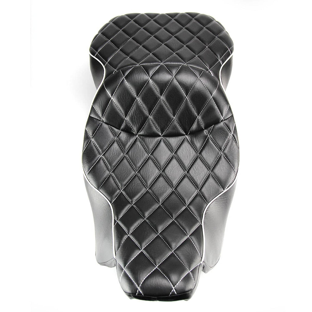 Black motorcycle seat with diamond-quilted top and white contrast stitching details.
