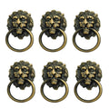 Bronze lion head drawer pull handles with oval ring, set of six shown