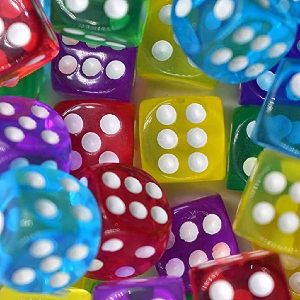 Close-up of translucent six-sided dice with white pips in red, purple, green, blue