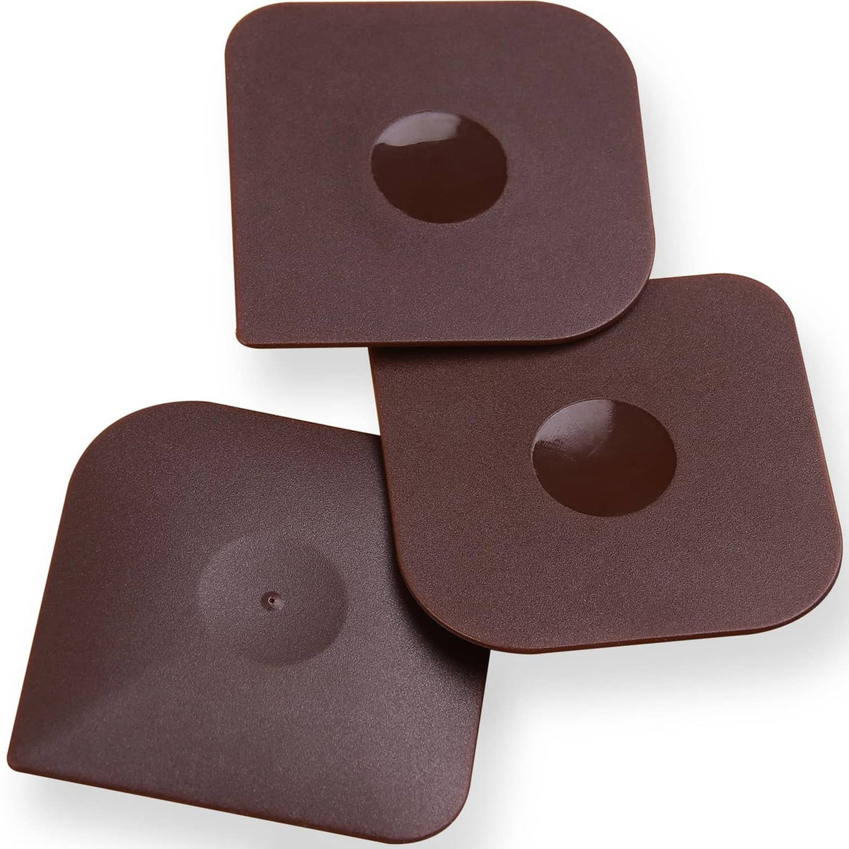 Set of three brown square pan scrapers with center finger holes