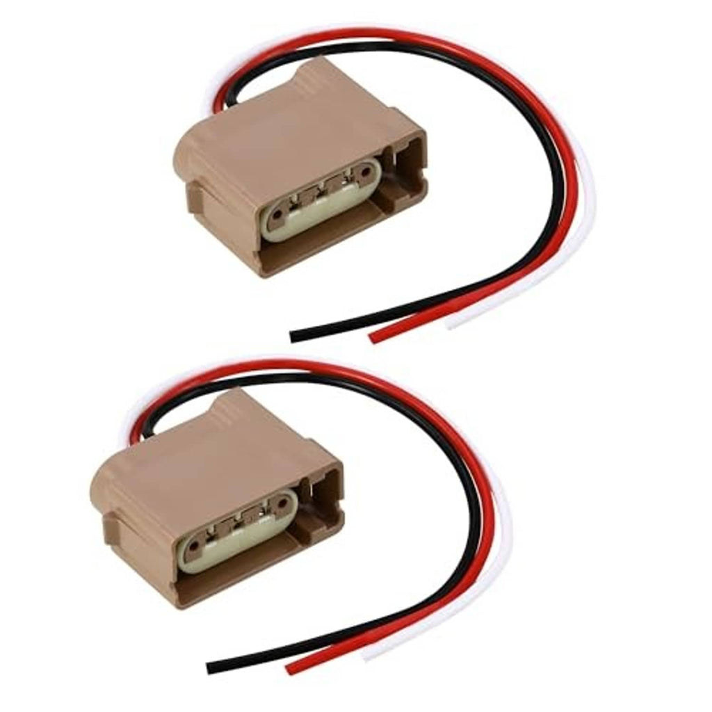 Two brown turn-signal pigtail connectors with red/black wire leads, separate pair