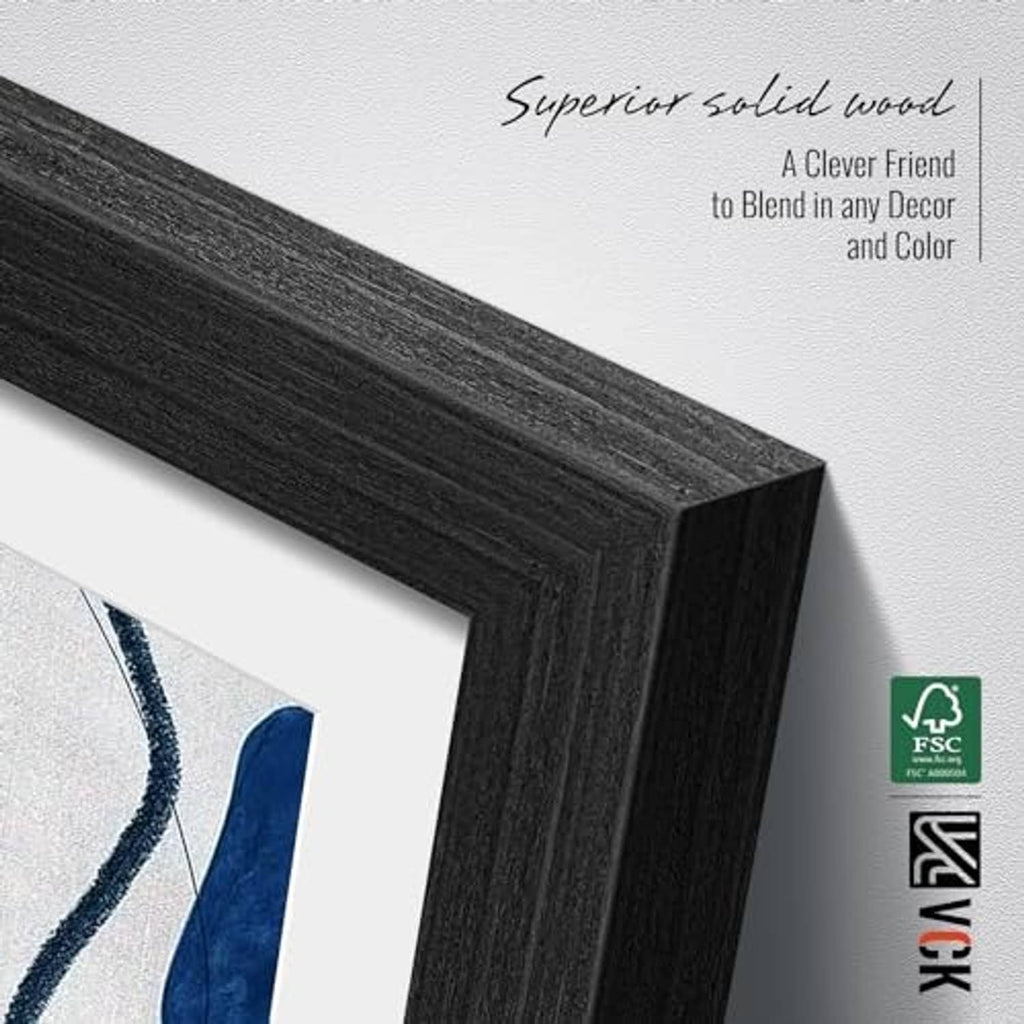 Black oak wooden picture frame with solid wood textured edge and real glass front.