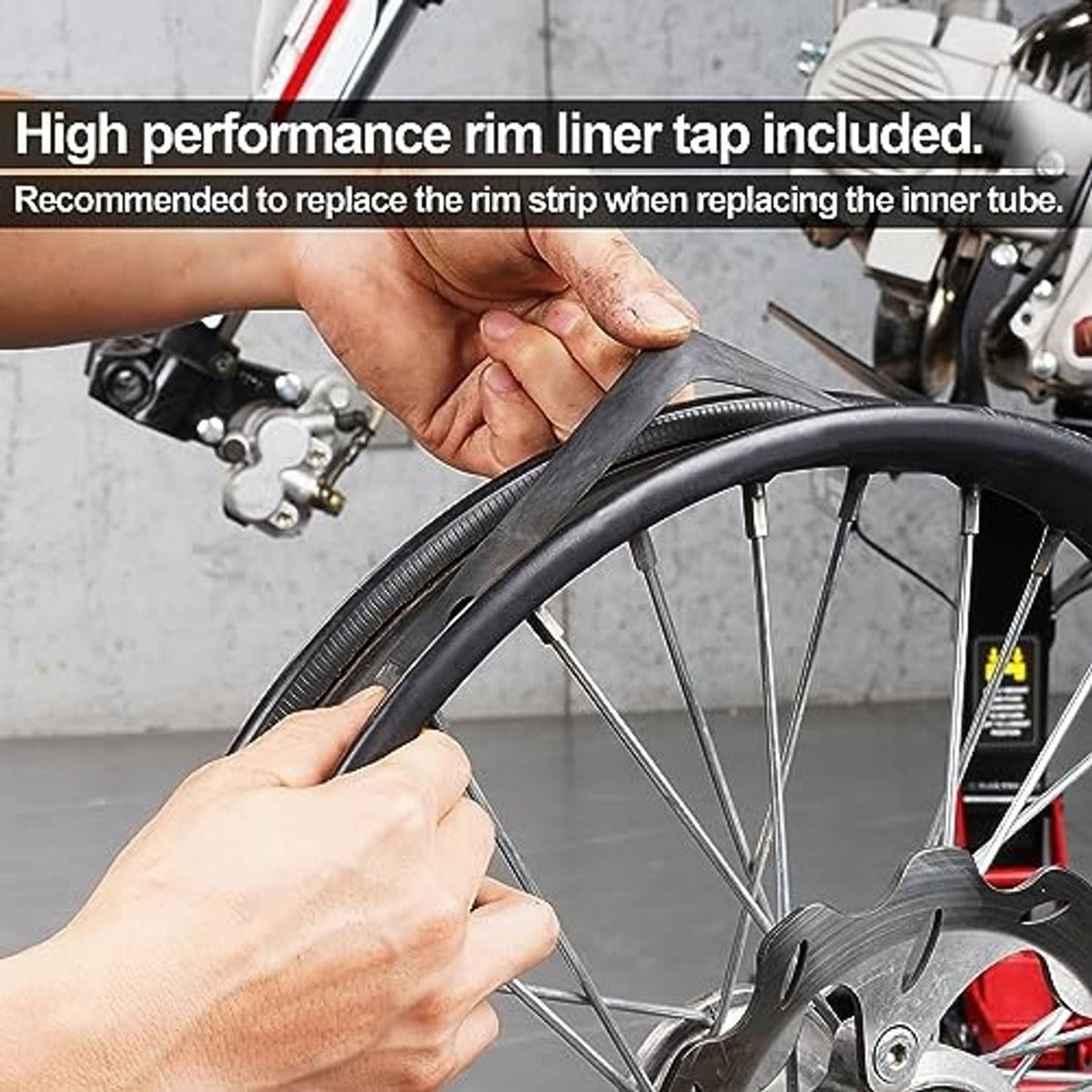 Rim liner tape and motorcycle inner tube installation with hands on the wheel rim